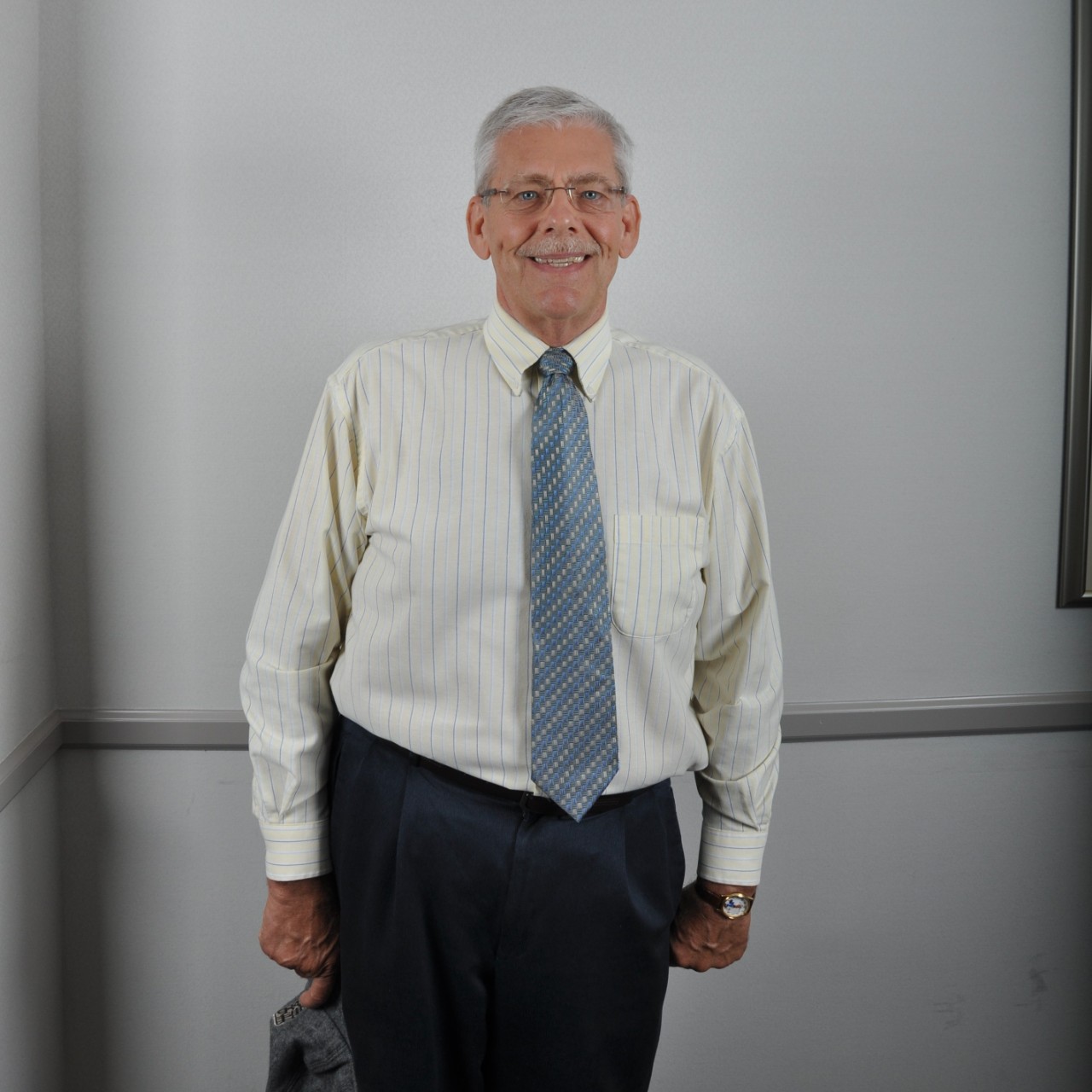 A distant photo of an elderly man..