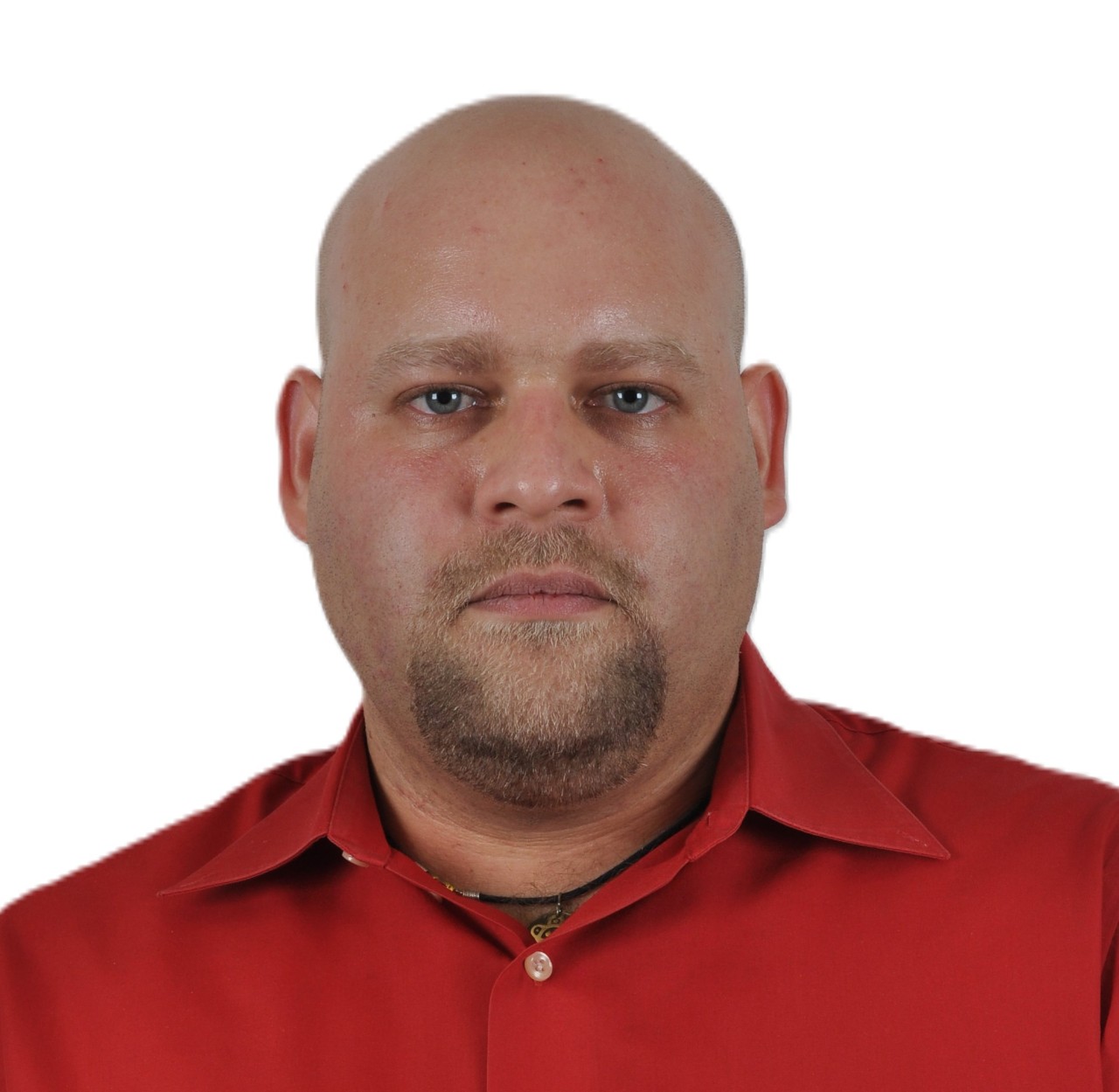 Photo of a man with a neutral facial expression.