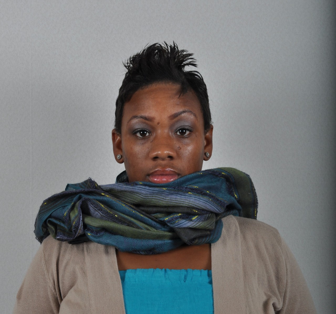 Photo of a woman wearing a scarf.